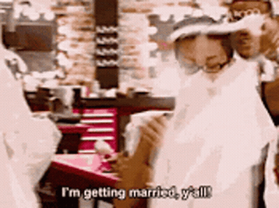 Man In Wedding Dress Talking To Woman In Wedding Dress GIF