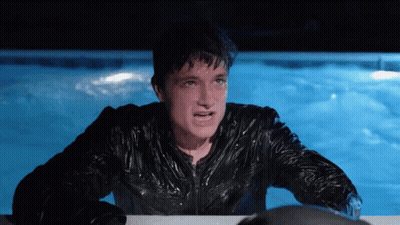 Man In Wet Jacket In Pool At Night GIF