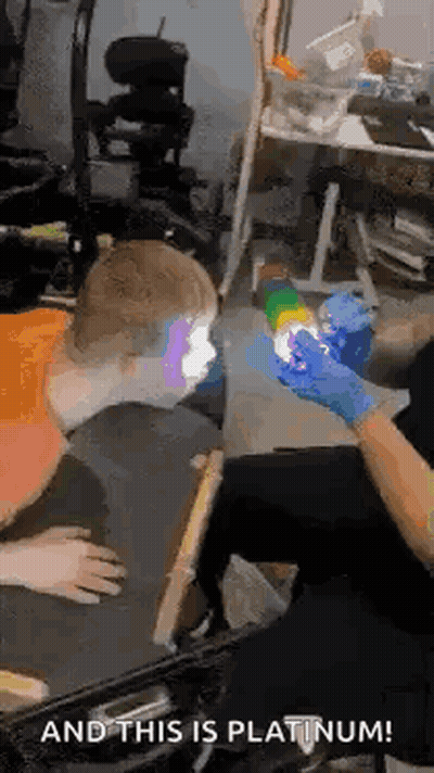 Man In Wheelchair Getting Face Tattoo GIF