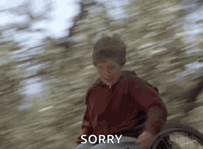 Man In Wheelchair Making Sorry Gesture GIF