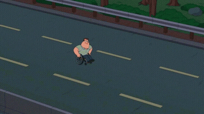 Man In Wheelchair On Highway GIF