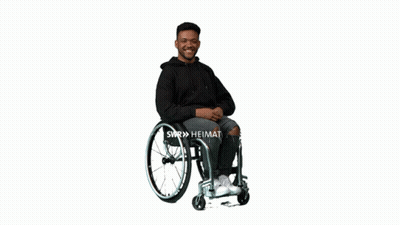 Man In Wheelchair Pointing With Swr Heimat GIF