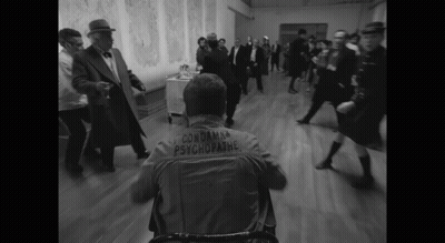 Man In Wheelchair With Condamna Psychopathe Jacket GIF