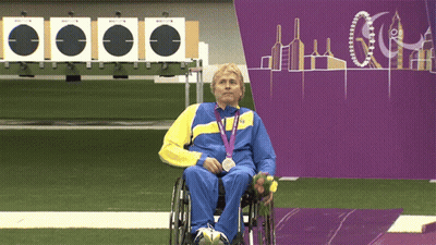 Man In Wheelchair With London 2012 Medal GIF