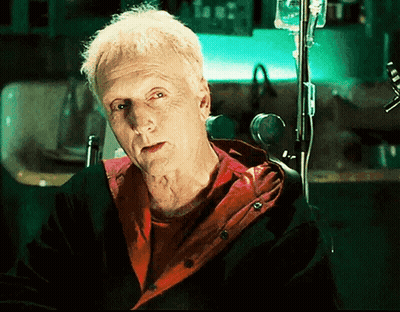 Man In Wheelchair With Needle In Arm GIF