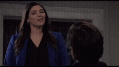 Man In Wheelchair With Two People In Living Room GIF