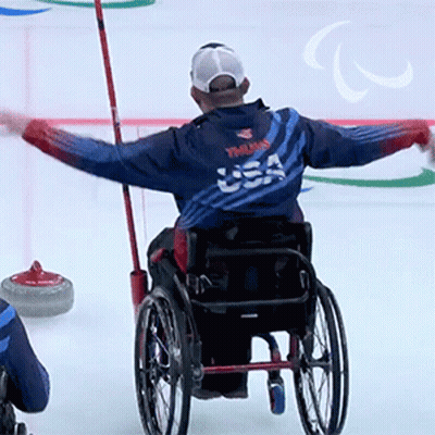 Man In Wheelchair With USA Jacket GIF