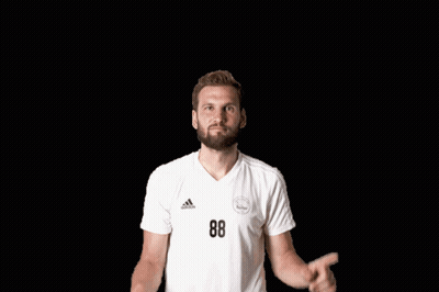 Man In White Adidas Shirt Points Up GIF