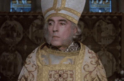 Man In White And Gold Cross Hat At Stained Glass Window GIF