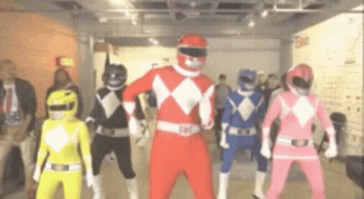 Man In White And Gold Power Ranger Costume With 'Feel The Power' Text GIF
