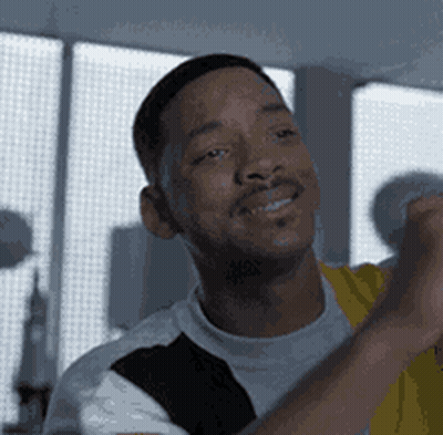 Man In White And Yellow Shirts Smiling GIF