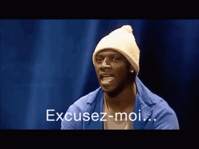 Man In White Beanie And Blue Jacket Says Excusez-Moi GIF