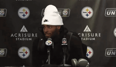 Man In White Beanie In Front Of Steelers Nation Unite Sign GIF
