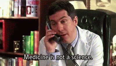 Man In White Coat Talking On Cell Phone GIF