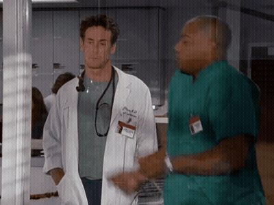 Man In White Coat With Name Tag Patrick GIF