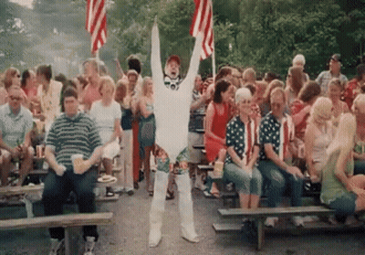 Man In White Costume Standing GIF