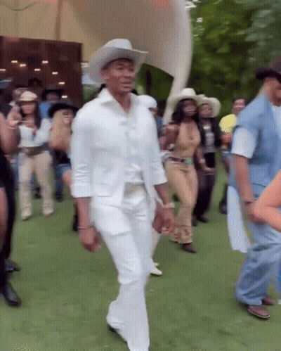 Man In White Cowboy Hat Dancing In Crowd GIF