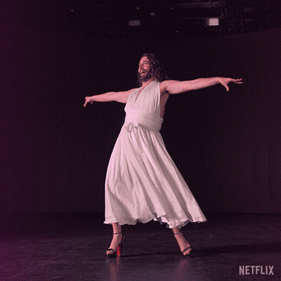 Man In White Dress And High Heels Dancing Netflix Logo GIF