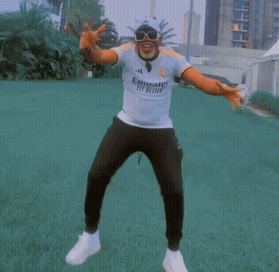 Man In White Emirates Fly Better Shirt Dancing GIF