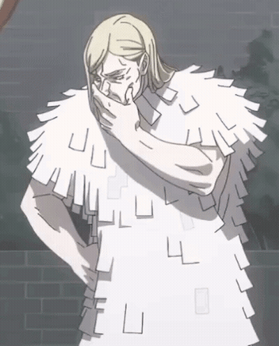 Man In White Feathered Cape Covering Mouth GIF
