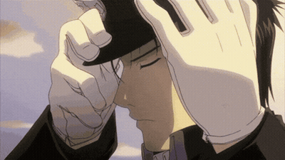 Man In White Gloves And Black Hat Looks Down GIF