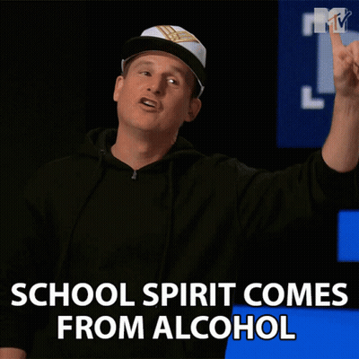 Man In White Hat And Black Hoodie School Spirit Comes From Alcohol GIF