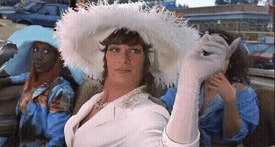 Man In White Hat And Gloves Sitting In Car With Women GIF