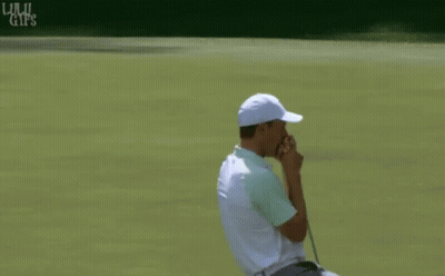 Man In White Hat And Green Shirt Holding Golf Club GIF