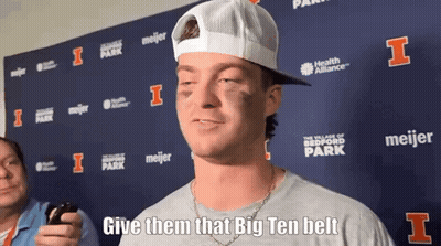 Man In White Hat And Grey Shirt Says Give Them That Big Ten Belt GIF