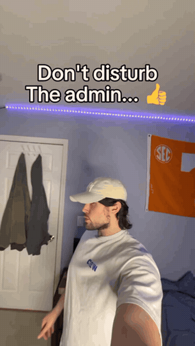 Man In White Hat And Shirt With SEC Flag GIF