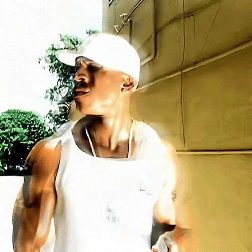 Man In White Hat And White Tank Top GIF