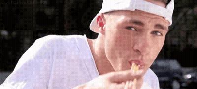 Man In White Hat Eating Sandwich GIF