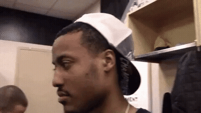 Man In White Hat Looking To Side GIF