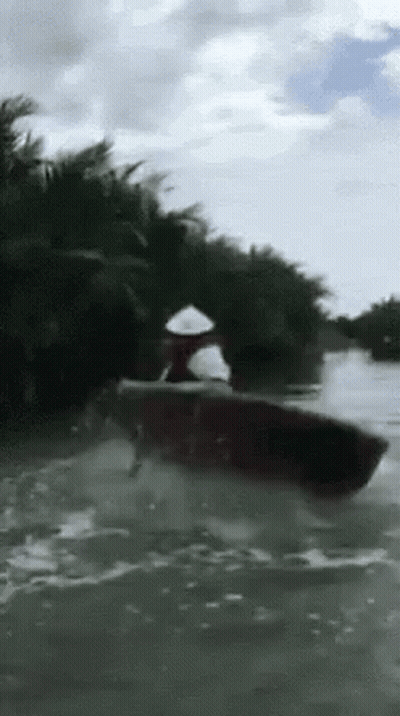 Man In White Hat Rowing Boat GIF