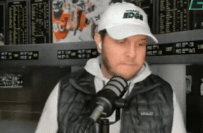 Man In White Hat Saying Edge Into Microphone GIF