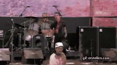 Man In White Hat Standing Before Drum Set GIF