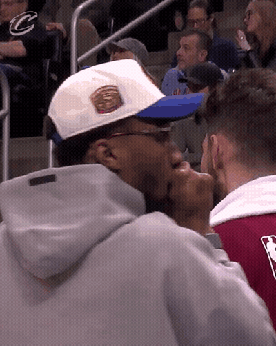 Man In White Hat With Blue Brim And C Sweatshirt GIF