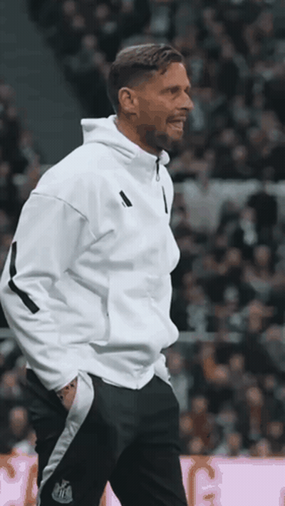 Man In White Hoodie And Black Pants On Soccer Field GIF