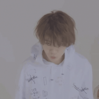 Man In White Hoodie With Graffiti GIF