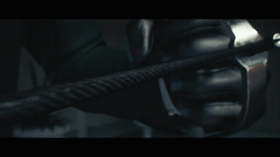 Man In White Hoodie With Hands Folded On Couch GIF