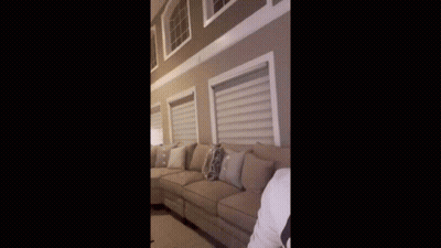 Man In White Hoodie With Letter A Laughing GIF