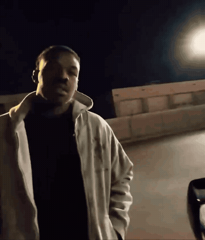 Man In White Jacket And Black Shirt GIF