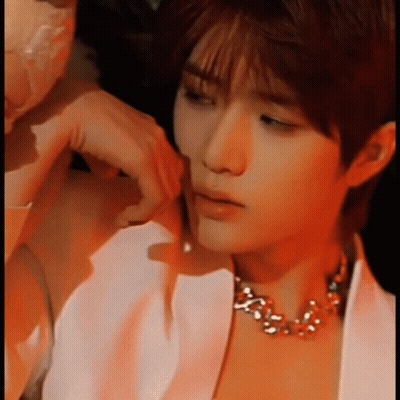 Man In White Jacket And Necklace GIF