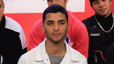 Man In White Jacket And Pink Sweatshirt GIF