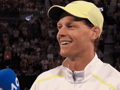 Man In White Jacket And Yellow Hat Smiling GIF