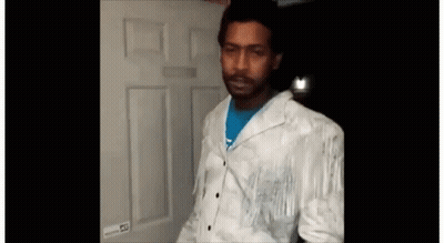 Man In White Jacket At Door GIF