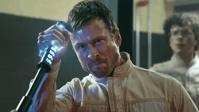 Man In White Jacket Holding Glowing Object GIF