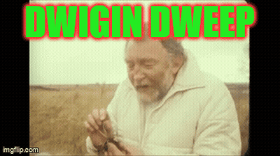Man in White Jacket Holding Something With Dwigin Dweep Above