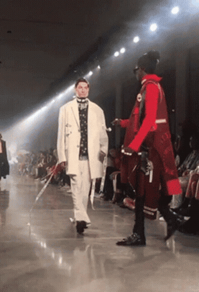 Man In White Jacket Walking Down Runway GIF
