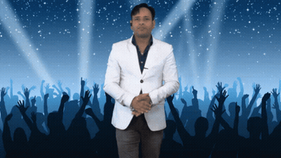 Man In White Jacket With Hands Up In Crowd GIF